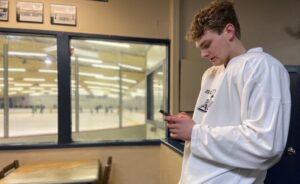 Tory Pitner, a potential college recruit, answers calls from colleges on Jan. 1, 2022. (Courtesy photo)