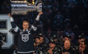 LOS ANGELES, CA - FEBRUARY 11, 2023: Dustin Brown holds up The Stanley Cup at an event where LA Kings retires Dustin Browns No. 23 at Crypto.com Arena Saturday, February 11, 2023, in Los Angeles, CA. Brown is the seventh Kings player to receive the honor of having his number (23) retired. Dustin Brown is the franchises all-time games-played leader and the first player in team history to lift the Stanley Cup. (Francine Orr/ Los Angeles Times via Getty Images)